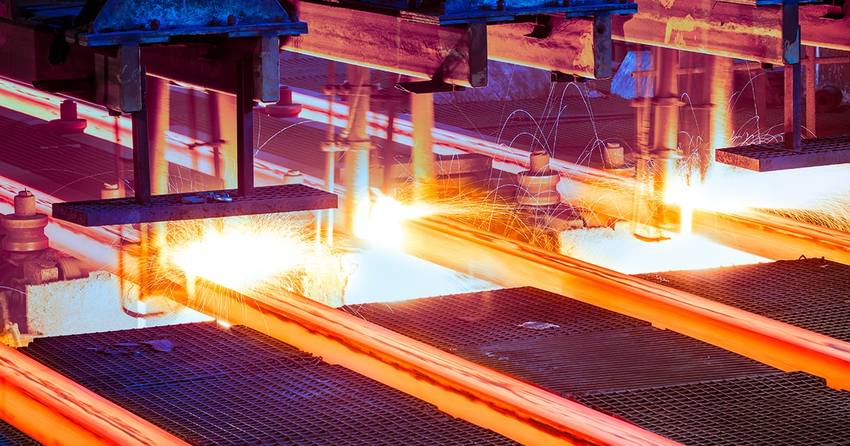 hot steel on conveyor in steel mill